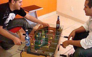 Foosball Coffee Table with People Playing